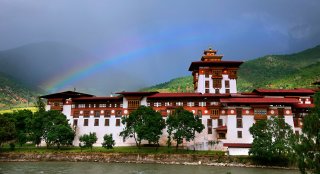 4-slide-bhutan-dzong-w-rainbow-pano.jpg